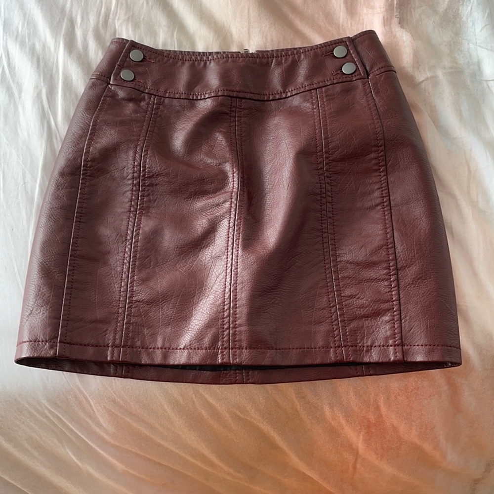 Free people faux-leather maroon skirt with zipper in the back. Only worn 1-2x